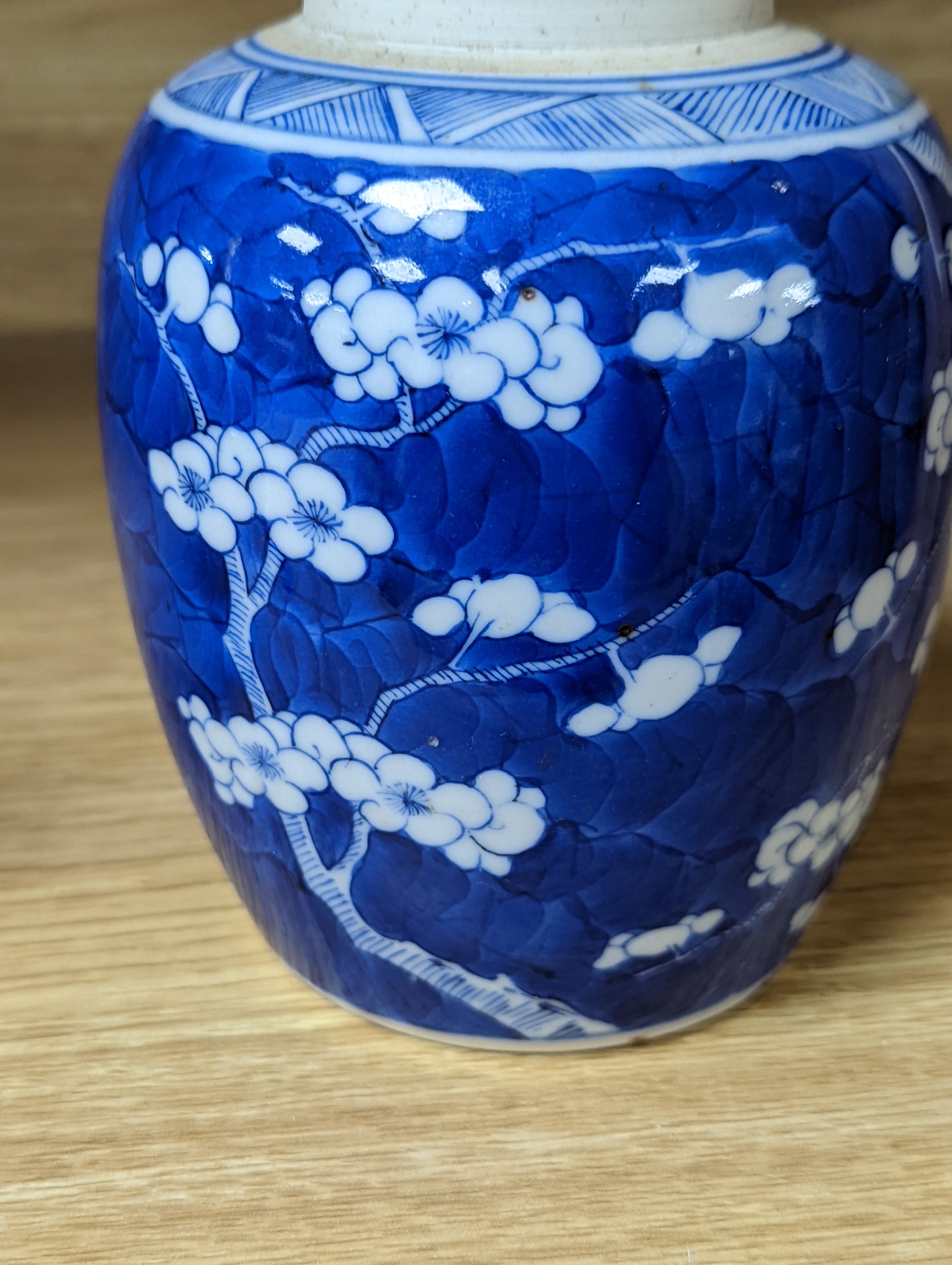 A 19th century Chinese blue and white prunus jar 13.5cm